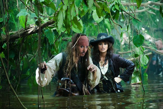 <p>Disney/Kobal/Shutterstock</p> Johnny Depp and Penélope Cruz in 2011's Pirates of the Caribbean: On Stranger Tides