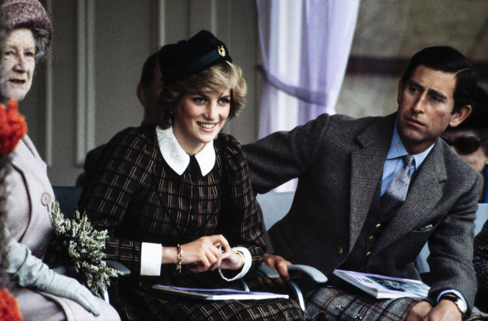 BRAEMAR - SEPTEMBER 4: Queen Elizabeth, the Queen Mother, Diana Princess of Wales and Prince Charles, watch the Braemar Games on September 4, 1982 at Braemar, near Balmoral, Scotland. The Princess wore a dress by Caroline Charles.(Photo by David Levenson/Getty Images)