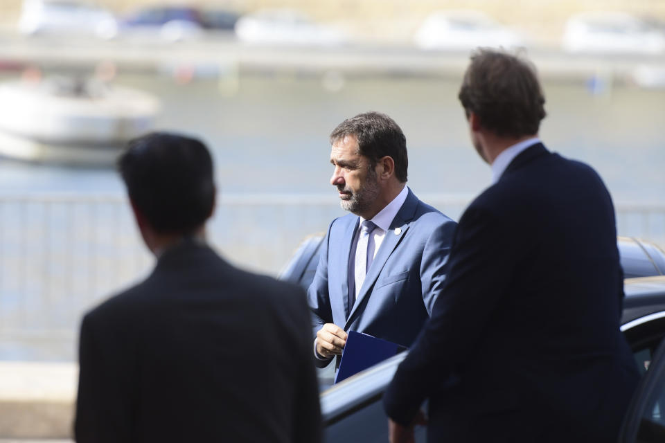 France's Interior Minister Christophe Castaner, right, arrives on the occasion of an informal meeting of EU interior ministers in Birgu, Malta, Monday, Sept. 23, 2019. The interior ministers from Italy, Malta, France and Germany were meeting in Malta on Monday to develop some automatic mechanism to assure that those rescued at sea will be distributed among other countries and not be the responsibility of the nations where they land. (AP Photo/Jonathan Borg)