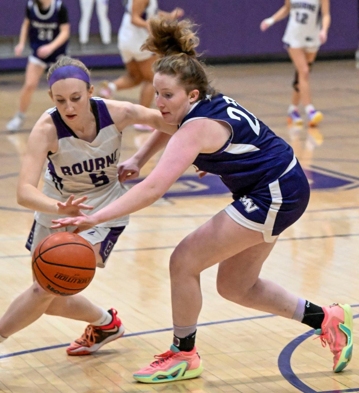 BOURNE 02/21/24 Paige Meda of Bourne steals the ball from Delilah Oliver of Martha's Vineyard girls basketball 
Ron Schloerb/Cape Cod Times