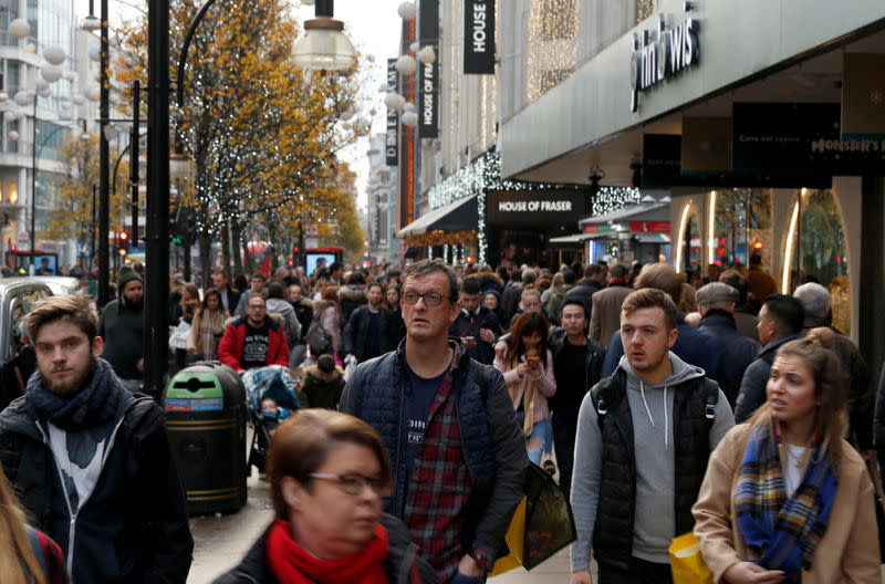Shoppers walk along Oxford Street in central London, Britain December 3, 2017. REUTERS/Darrin Zammit Lupi