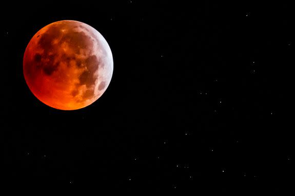 Mandatory Credit: Photo by VALENTIN FLAURAUD/EPA-EFE/REX/Shutterstock (10069484b) A total lunar eclipse is pictured in Allaman, Switzerland, 21 January 2019. The entire eclipse was visible from North and South America, as well as parts of western Europe and north Africa. The phenomenon was referred to by some as a 'super blood wolf moon' being a combination of a 'blood moon' as, during the eclipse, only the sun rays refracted by the earth atmosphere are reflected from the moon surface and give it a reddish color, a 'supermoon' given the large apparent size of the moon due to its relative proximity to earth and finally a 'wolf moon', the name often given to the full moon in January. Lunar eclipse in Switzerland, Allaman - 21 Jan 2019