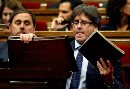 Catalonia's President Carles Puigdemont gestures during a confidence vote session at Catalan Parliament in Barcelona, Spain September 29, 2016. REUTERS/Albert Gea