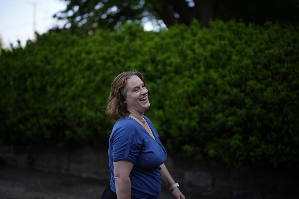 Heather Boyd, Democratic candidate for Pennsylvania House of Representatives, laughs while talking with supporters before voting at her polling place, Christ's Community Church, Tuesday, May 16, 2023, in Drexel Hill, Pa. (AP Photo/Matt Slocum)