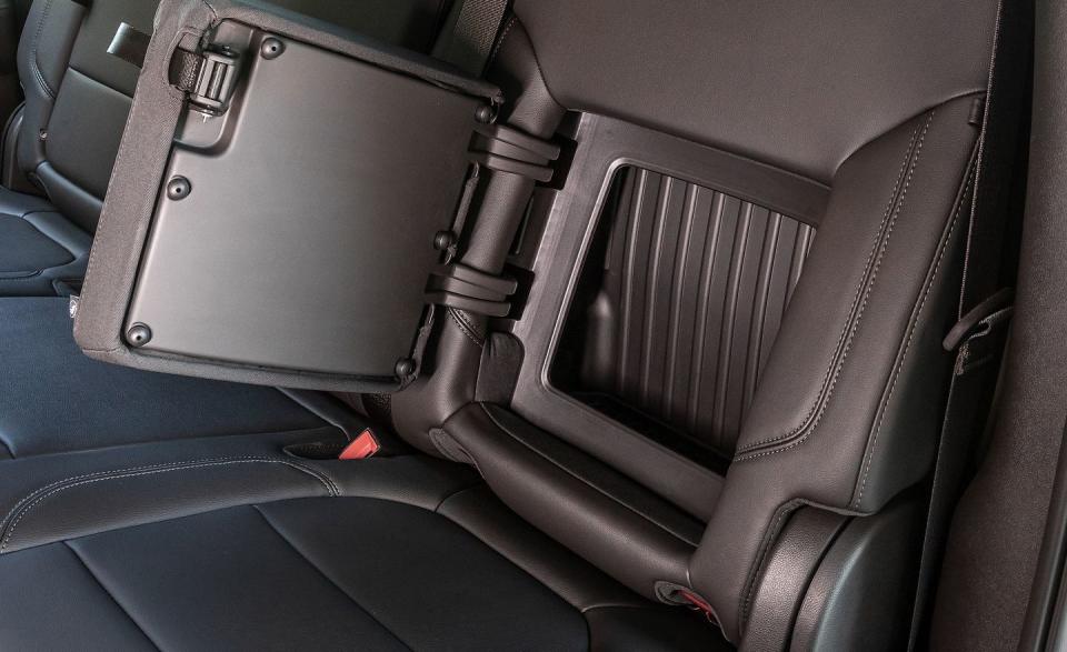 <p>One of the Silverado's neat features is a small storage nook incorporated in the rear seatback. Happily, it doesn't affect seat comfort.</p>