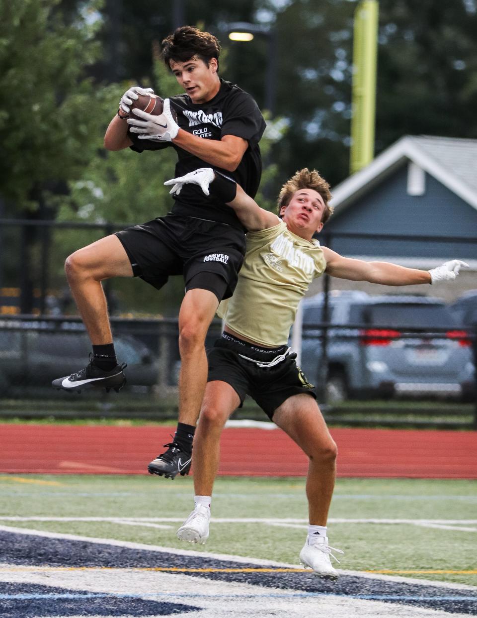 Carver's Robbie Peterson makes the catch at the Northeast 7v7 football finals at Xaverian High Schools in Westwood on Thursday, August 3, 2023.