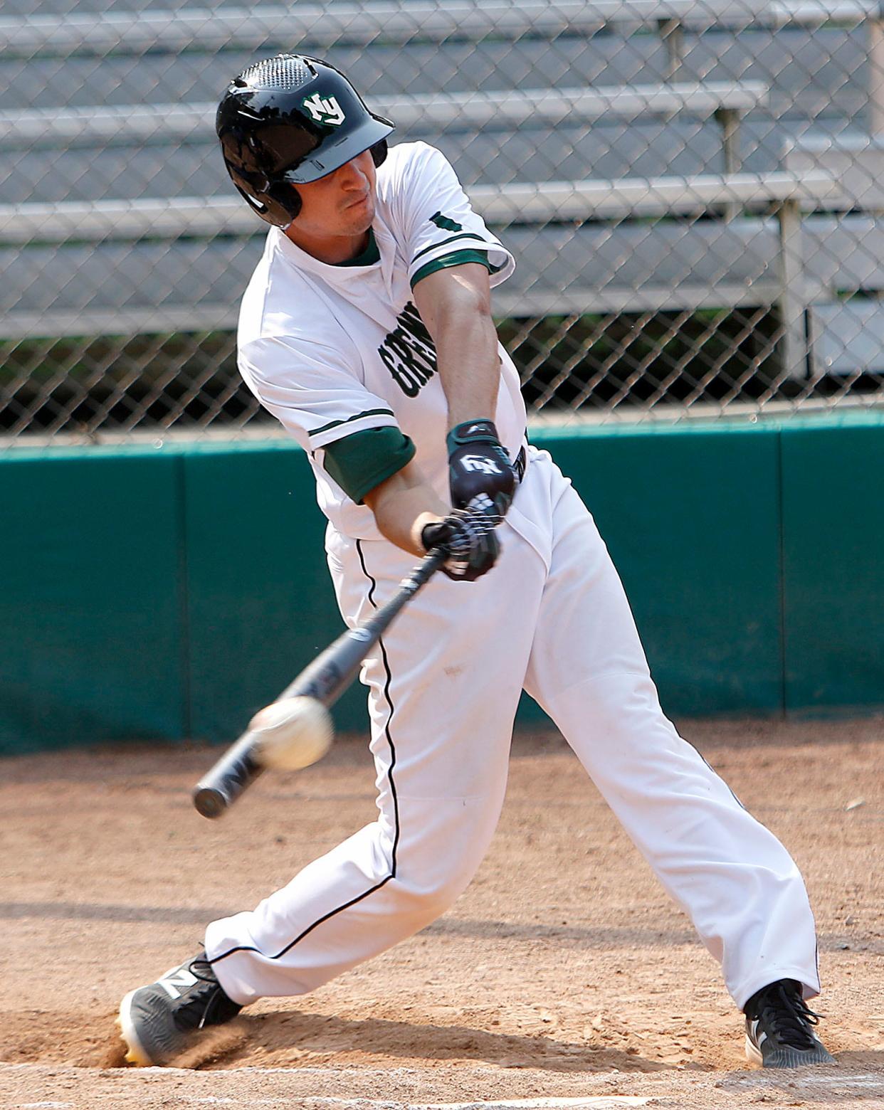 New York Gremlins' Ben Enoka connects with a pitch for a double in the second inning against the Kegal Black Knights in the championship game Sunday, July 18, 2021 at Brookside Park. TOM E. PUSKAR/TIMES-GAZETTE.COM