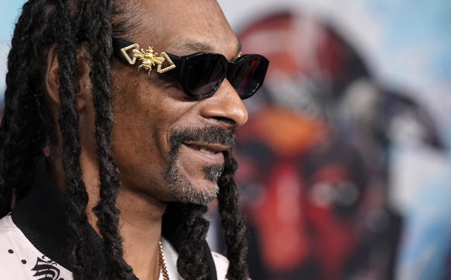 Rapper Snoop Dogg arrives at the premiere of the FX docuseries "Dear Mama," Tuesday, April 18, 2023, at The Ted Mann Theater in Los Angeles. The series explores the legacies of rapper Tupac Shakur and his mother Afeni. (AP Photo/Chris Pizzello)