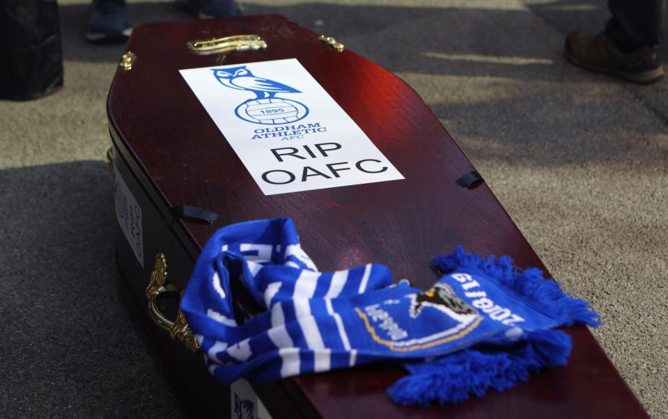  coffin is seen outside the stadium as fans protest against Oldham Athletic owner Abdallah Lemsagem - James Gill/Getty Images