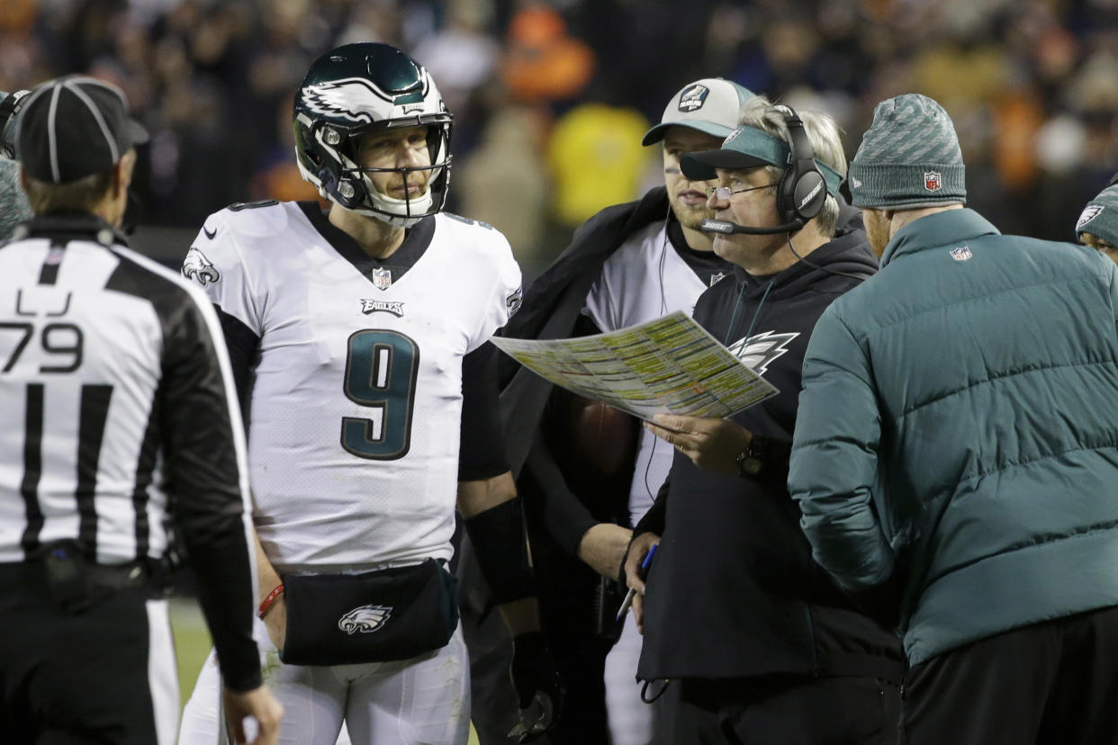 Philadelphia Eagles quarterback Nick Foles (9) talks to head coach Doug Pederson. (AP)