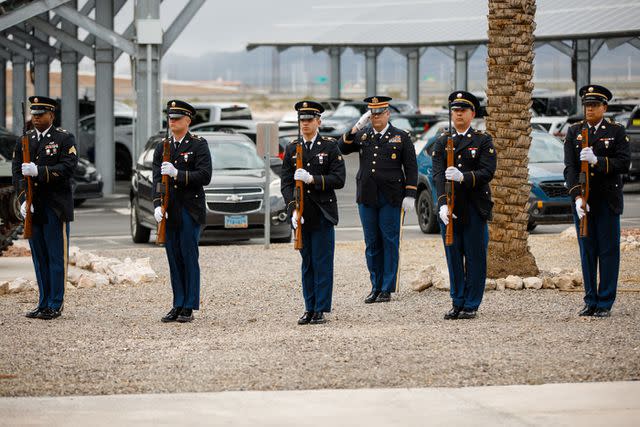 <p>U.S. Army National Guard photo by Spc. Adrianne Lopez</p> Members of the Nevada National Guard hold a gun salute at the ceremony