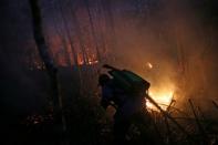 Carlos Leige, a resident, fights wildfires in Santa Monica community near Concepcion