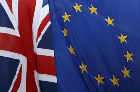 A Union flag flies next to the flag of the European Union in London, Britain March 2, 2017. REUTERS/Stefan Wermuth