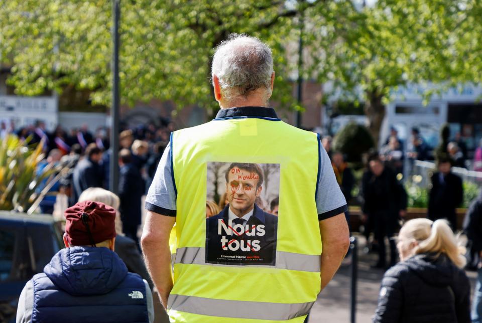 Mr Macron’s visit to Denain also attracted protesters opposed to another term for the incumbent (AFP via Getty Images)