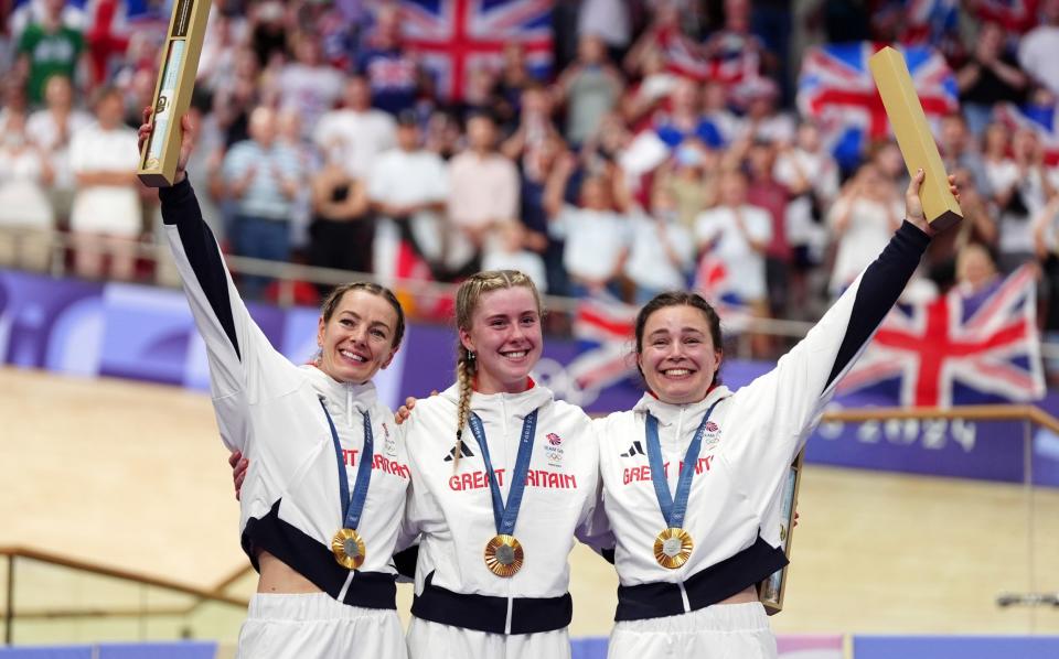 Team GB celebrate gold in the women's team sprint