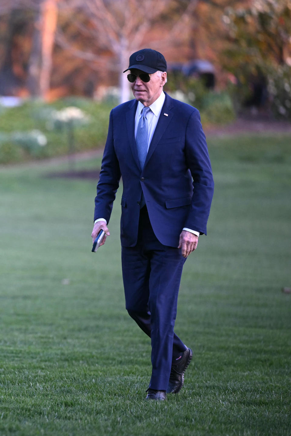 US President Joe Biden walks on the South Lawn of the White House upon arrival in Washington, DC, on March 21, 2024. Biden returned from a three-day campaign trip in Nevada, Arizona and Texas. (Photo by Mandel NGAN / AFP) (Photo by MANDEL NGAN/AFP via Getty Images)