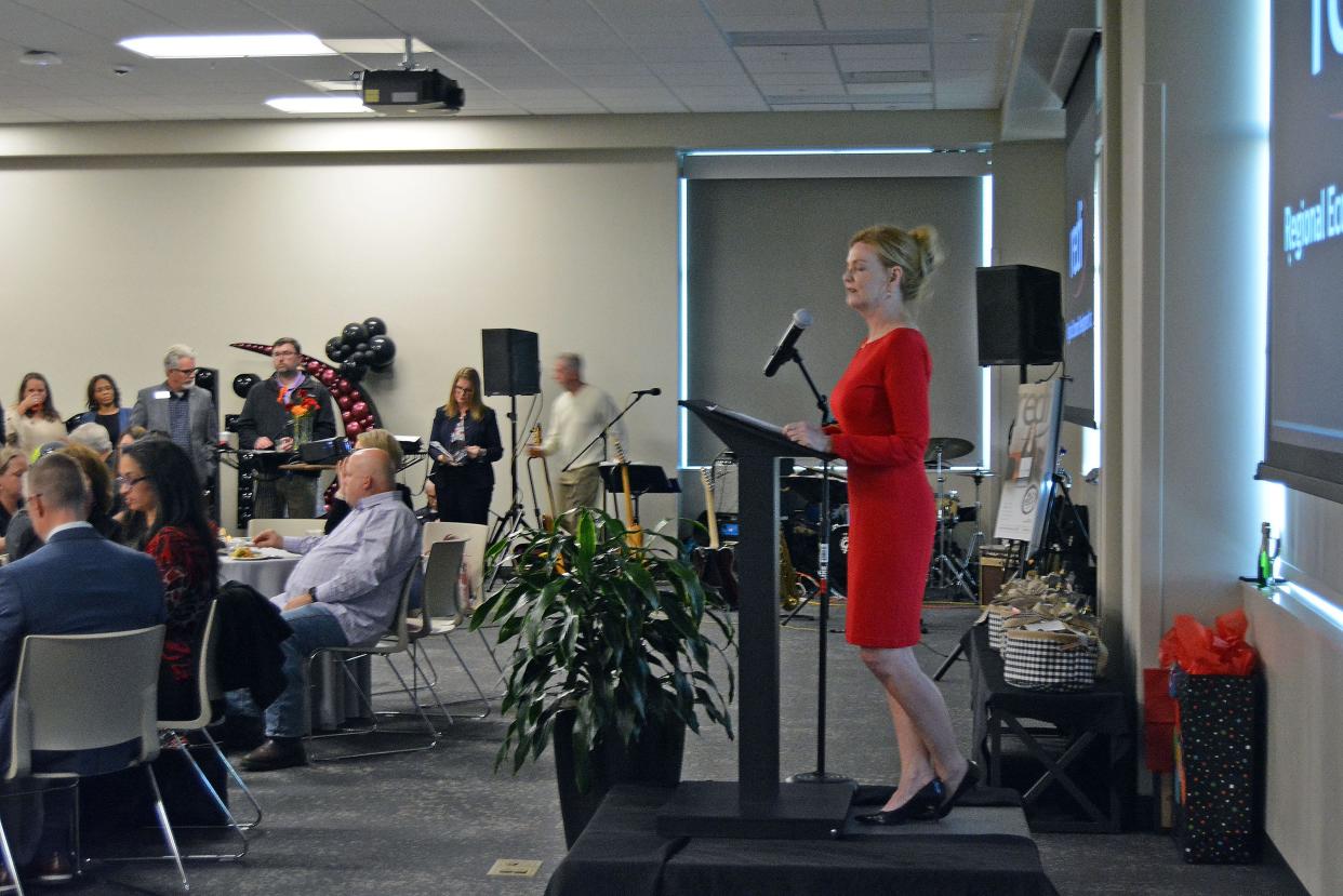 Regional Economic Development Inc. President Stacey Button welcomes guests Wednesday to the organization's annual meeting at the community room of Boone Electric Cooperative. The meeting was a celebration of achievements over the last year.