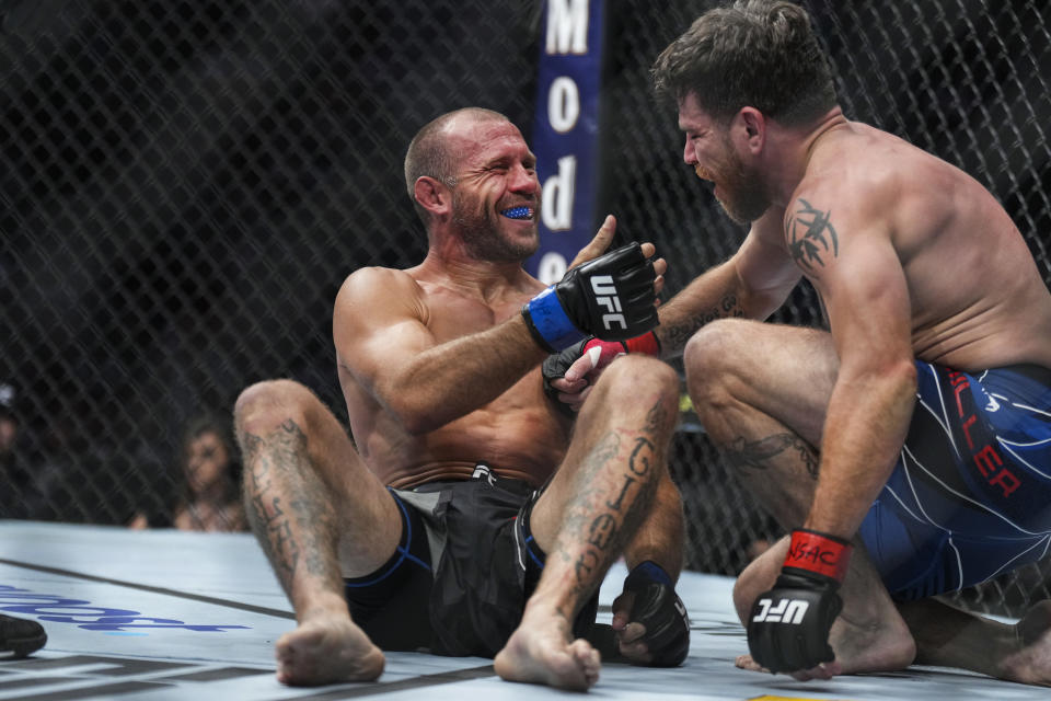 LAS VEGAS, NEVADA - JULY 02: (L-R) Donald Cerrone and Jim Miller talk after the conclusion of the round in a welterweight fight during the UFC 276 event at T-Mobile Arena on July 02, 2022 in Las Vegas, Nevada. (Photo by Chris Unger/Zuffa LLC)