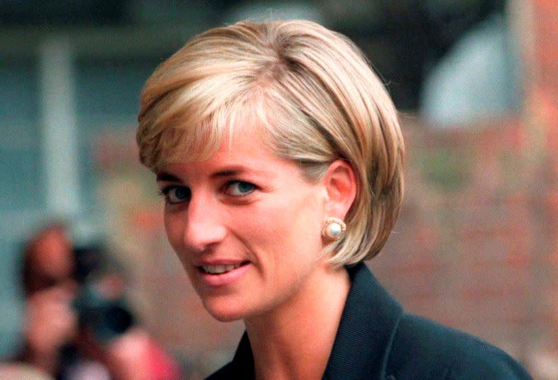 FILE PHOTO: Princess Diana arrives at the Royal Geographical Society in London