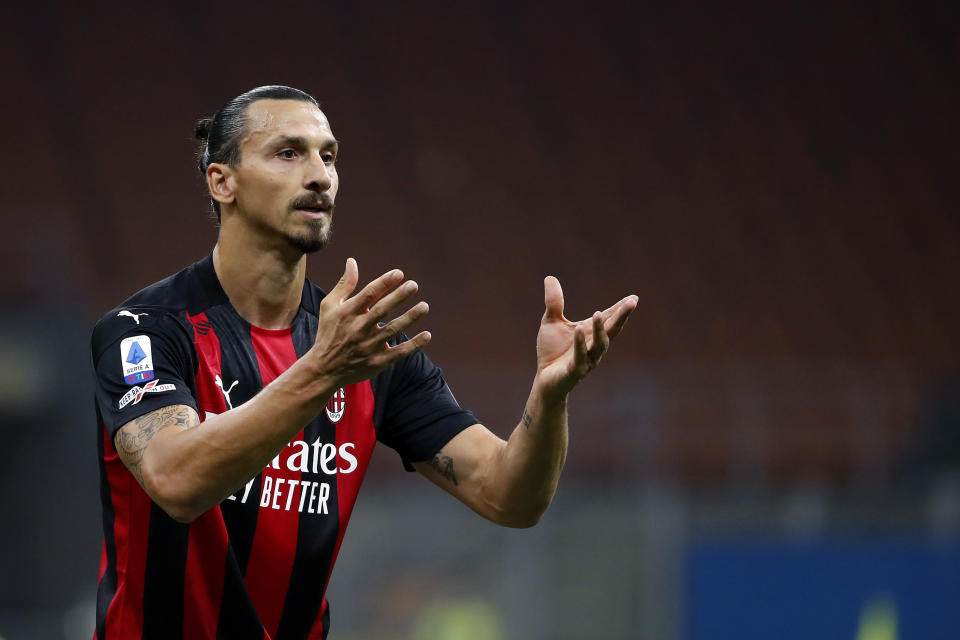 FILE - In this Sept. 21, 2020 file photo, AC Milan's Zlatan Ibrahimovic reacts during the Serie A soccer match between AC Milan and Bologna at the San Siro stadium, in Milan, Italy. The Swedish ace tested positive to COVID-19 and will miss tonight's Europa League 3rd round qualifying soccer match between AC Milan and Bodo Glimt and also a few of the next matches of the Italian Serie A. (AP Photo/Antonio Calanni)