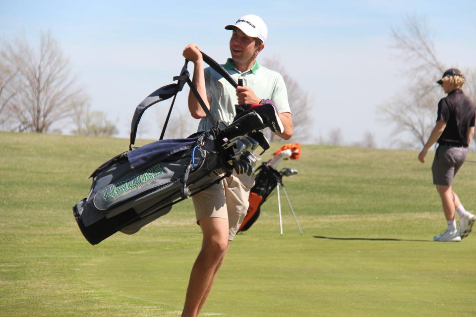 Woodward-Granger's Nick Bermel heads to the next hole during an invitational on Thursday, April 13, 2023, at Woodward Golf Club.