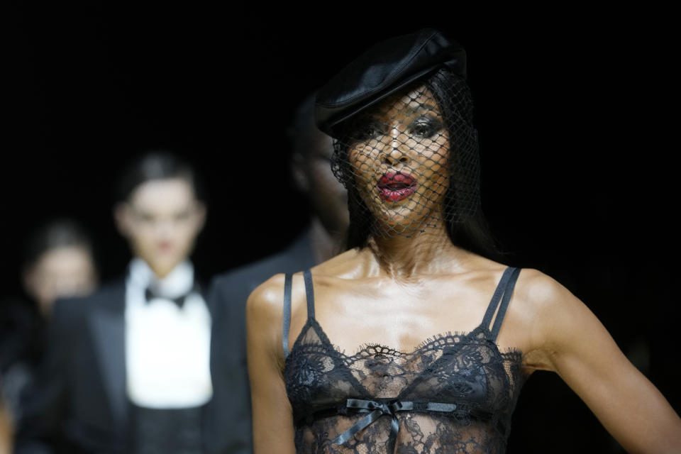 Naomi Campbell wears a creation as part of the Dolce & Gabbana women's Fall-Winter 2024-25 collection presented in Milan, Italy, Saturday, Feb. 24, 2024. (AP Photo/Luca Bruno)