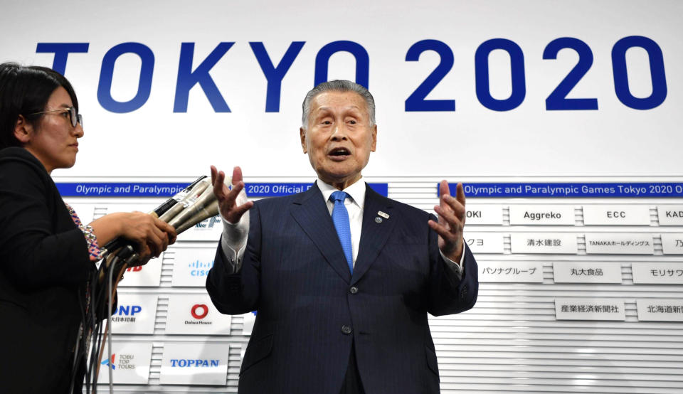 Yoshiro Mori, president of the 2020 Tokyo Olympics organizing committee, speaks to the media in Tokyo, Thursday, Oct. 17, 2019. Sapporo officials are thrilled with a proposal to move next year's Tokyo Olympic marathons to the northern Japanese city to avoid the summer heat in the city.(Kyodo News via AP)