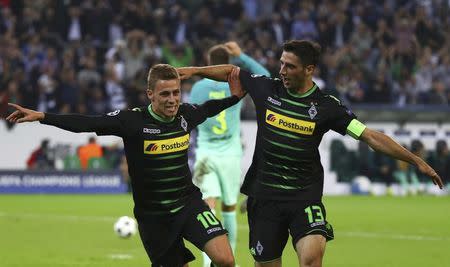 Football Soccer - Borussia Moenchengladbach v FC Barcelona - UEFA Champions League group stage - Group C - Borussia Park stadium, Moenchengladbach, Germany - 28/09/16 - Moenchengladbach's Thorgan Hazard and Lars Stindl react after scoring REUTERS/Kai Pfaffenbach