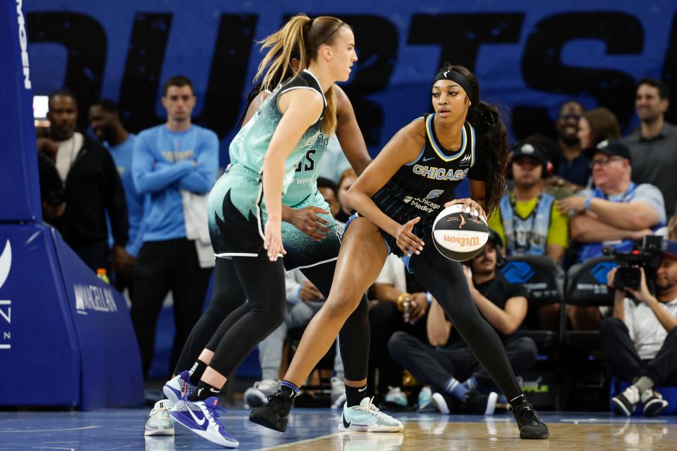 Chicago Sky forward Angel Reese (5) controls the ball against the New York Liberty.