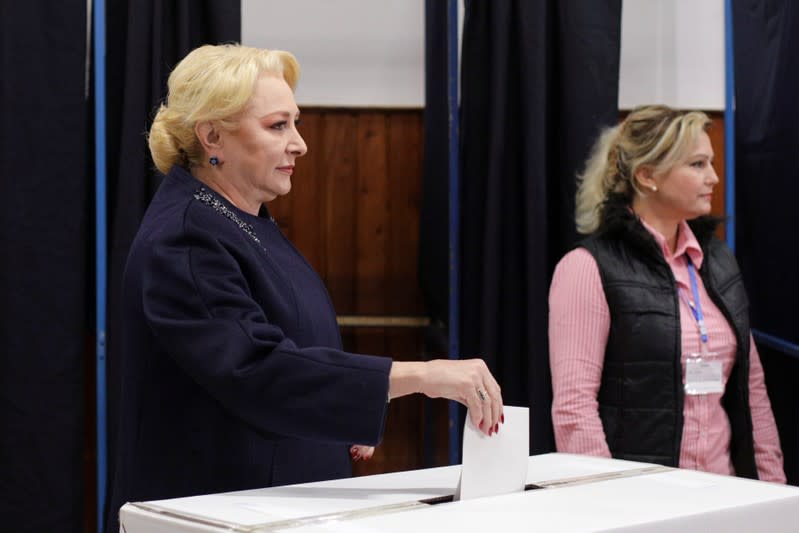 Former Romanian Prime Minister and presidential candidate Viorica Dancila casts her ballot in the second round of a presidential election