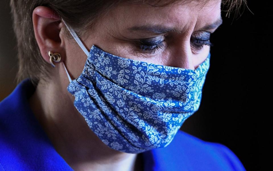 First Minister Nicola Sturgeon arrives prior to announcing her plans to halt the spread of coronavirus at the Scottish Parliament -  Getty Images Europe