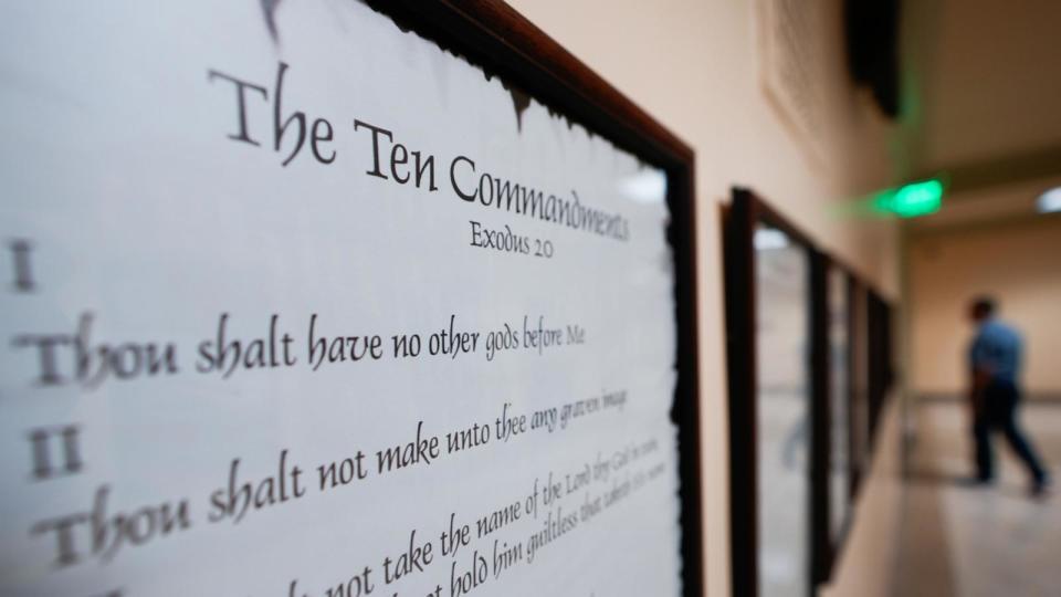 PHOTO: A copy of the Ten Commandments is posted along with other historical documents in a hallway of the Georgia Capitol, June 20, 2024, in Atlanta.  (John Bazemore/AP)