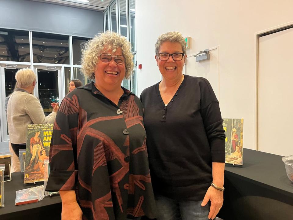 Denyse Rodrigues (left) and Terrah Keener (right) led a presentation about lesbian pulp fiction on Wednesday night at the Halifax Central Library. 