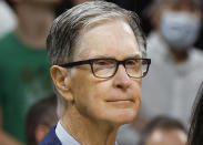 FILE - Boston Red Sox owner John Henry attends an NBA basketball game between the Boston Celtics and the Miami Heat, Friday, Oct. 27, 2023, in Boston. The PGA Tour is getting a $3 billion investment from Strategic Sports Group in a deal that would give players access to more than $1.5 billion as equity owners in the new PGA Tour Enterprises. SSG is led by Fenway Sports Group. Our enthusiasm for this new venture stems from a very deep respect for this remarkable game and a firm belief in the expansive growth potential of the PGA Tour,” said Henry, the principal owner of Fenway Sports and manager of SSG. (AP Photo/Michael Dwyer, File)