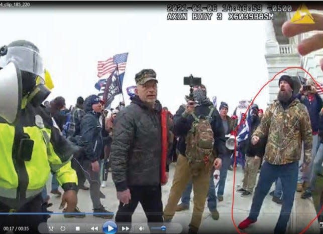 Authorities say Scott Fairlamb, of Stockholm, allegedly shown at the right, took part in the riots at the U.S. Capitol on Jan. 6.
