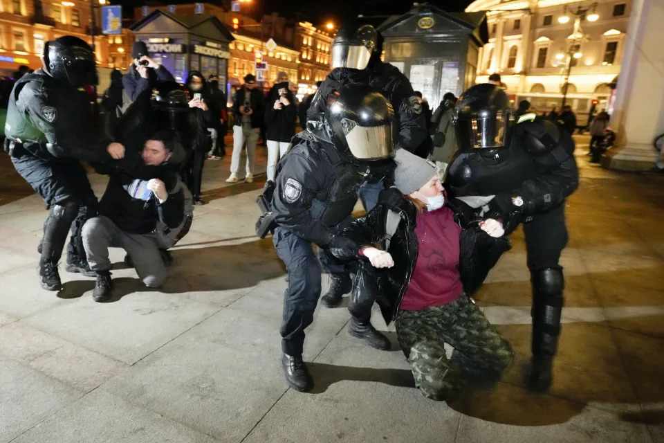 FILE - Police detain people protesting Russia's attack on Ukraine in St. Petersburg, Russia, Tuesday, March. 1, 2022. In the last two years, ordinary Russians have been increasingly swept up in an unprecedented government crackdown, together with opposition politicians, independent journalists and human rights activists. (AP Photo, File)