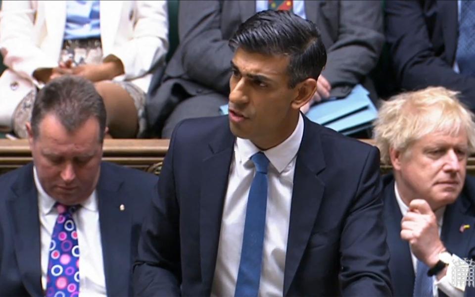 Rishi Sunak, the Chancellor, is pictured in the House of Commons this afternoon - AFP