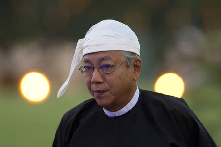 FILE PHOTO- Myanmar's new President Htin Kyaw arrives for a dinner reception following swearing in ceremony in Naypyitaw, Myanmar, March 30, 2016. REUTERS/Ye Aung Thu/File Photo