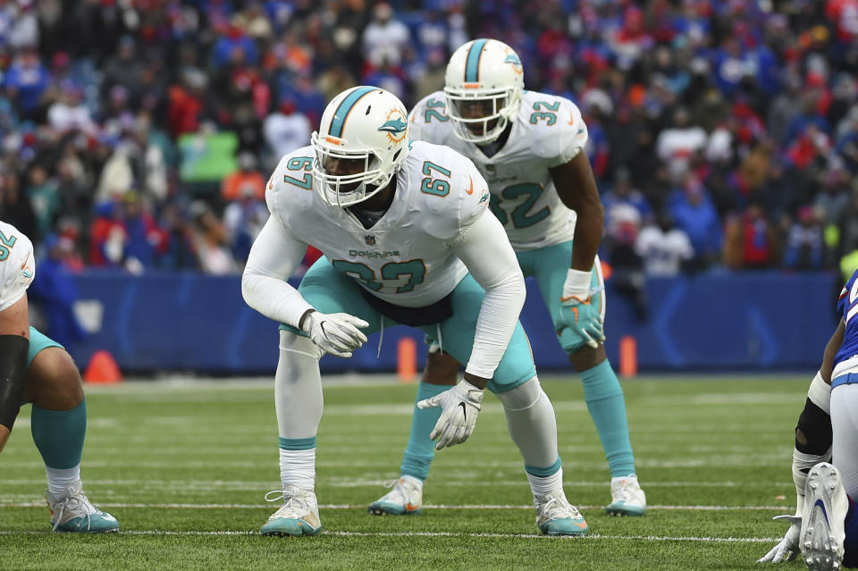 FILE - In this Dec. 17, 2017, file photo, Miami Dolphins offensive tackle Laremy Tunsil (67) lines up against the Buffalo Bills during the second half of an NFL football game in Orchard Park, N.Y. The Houston Texans continued a busy day of trades by addressing a glaring need to upgrade their offensive line by acquiring Tunsil from the Dolphins in a deal which also netted them receiver Kenny Stills, a source familiar with the deal tells The Associated Press. (AP Photo/Rich Barnes, File)