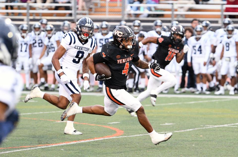 Ventura College running back Jaylen Thompson runs upfield against visiting Cerritos College on Saturday night at the VC Sportsplex. The Pirates fell 35-31.