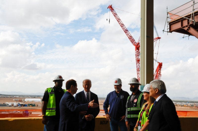 President Joe Biden visits an upcoming “friendshored” TSMC semiconductor factory in Arizona