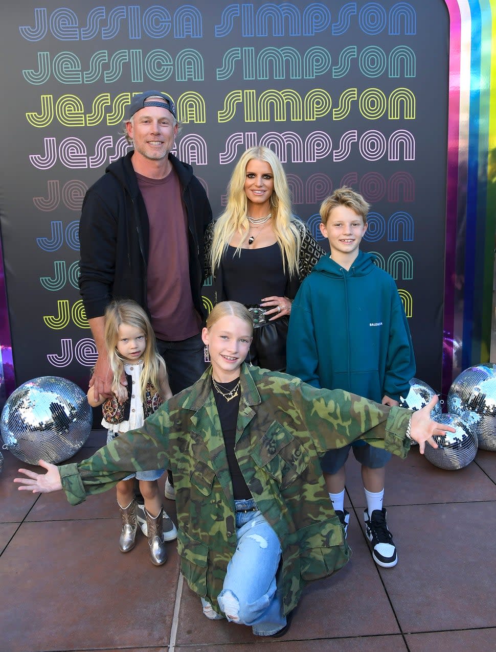 Birdie Mae Johnson, Eric Johnson, Jessica Simpson, Ace Knute Johnson and Maxwell Drew Johnson celebrate the launch of Jessica Simpson's Fall Collection with fans and a special performance by the LA Roller Girls at Nordstrom at The Grove on September 24, 2022 in Los Angeles, California. 