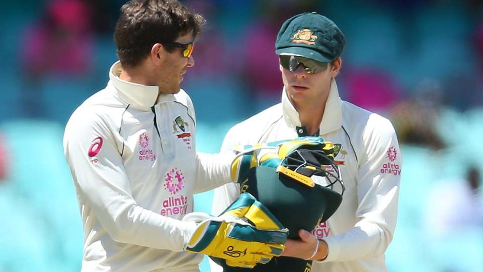 Tim Paine and Steve Smith, pictured here during the third Test between Australia and India.