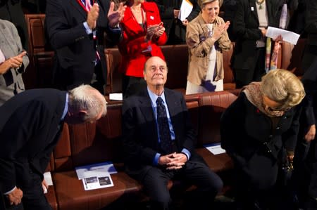 FILE PHOTO: File photo of former French President Jacques Chirac applauded at the awards ceremony for the Prix de la Fondation Chirac at the Musee du Quai Branly in Paris