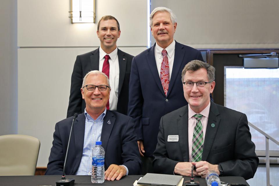 Director of the U.S. Space Development Agency Derek Tournear, top left, stands with Sen. John Hoeven, Sen. Kevin Cramer and UND President Andrew Armacost, at an event announcing the designation of Grand Forks Air Force Base as the SDA's first satellite networking center.