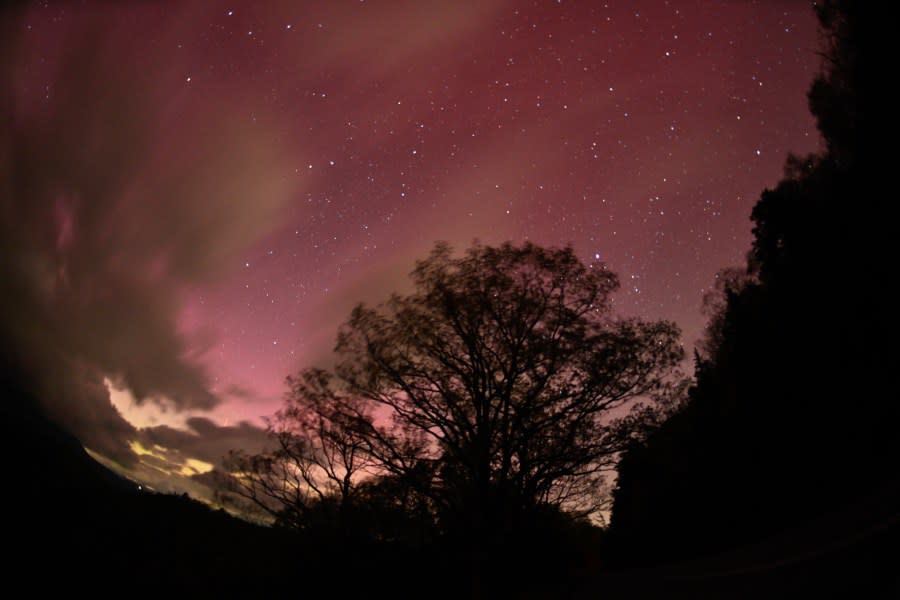 <em>MOUNT MITCHELL, UNITED STATES – MAY 10: Unusual sun activity created a G5 Geostorm on Earth sparks northern lights (Aurora Borealis) in Mount Mitchell, North Carolina, United States on May 10, 2024. (Photo by Peter Zay/Anadolu via Getty Images)</em>