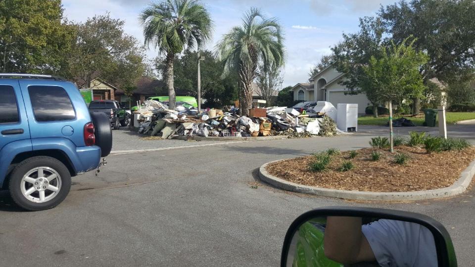 Servpro owners Lauren Braddock and Ben Alcorn sent employees out to help with cleanup folllowing Hurricane Matthew flooding in the Sanctuary neighborhood of Jacksonville Beach.
