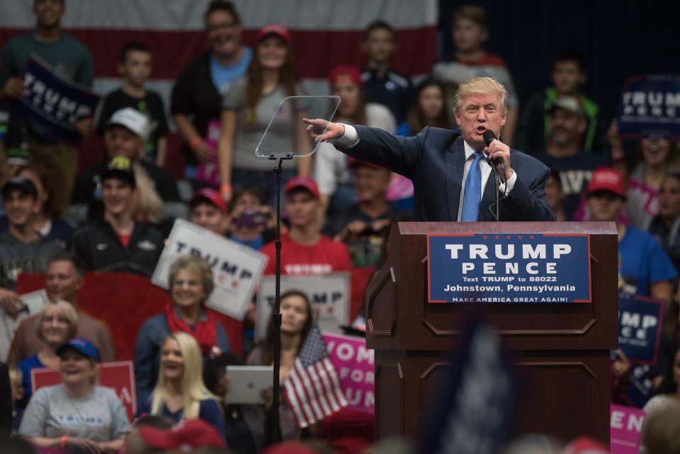 Republican presidential nominee Donald Trump points to the crowd during a campaign stop at the Cambria County War Memorial Arena on October 21, 2016 in Johnstown, Pennsylvania.Getty Images