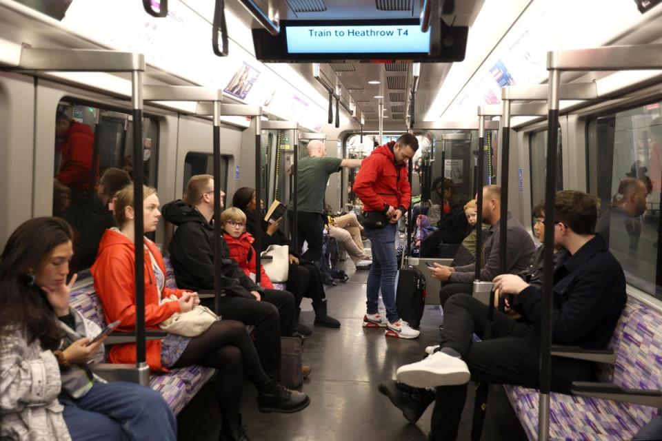 Passengers on the Elizabeth line  (Suzan Moore/PA)