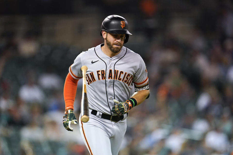 San Francisco Giants' Evan Longoria tosses his bat after hitting a two-run home run against the Detroit Tigers in the sixth inning of a baseball game in Detroit, Tuesday, Aug. 23, 2022. (AP Photo/Paul Sancya)